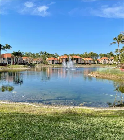 a view of a lake with houses