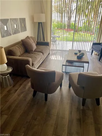 a bedroom with furniture and a couch