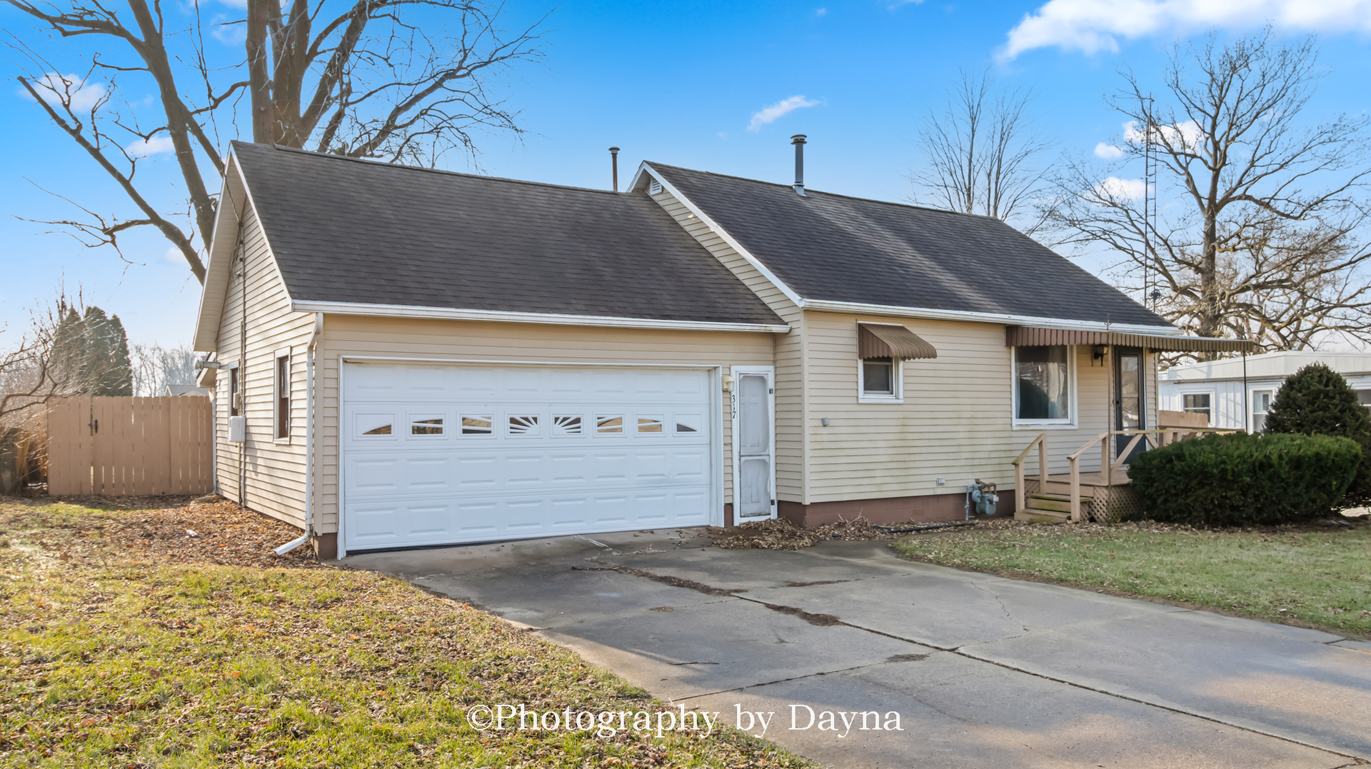 317 Thomas Street Martinton, IL 60951 - Photo 22 of 22 a front view of a house with a yard