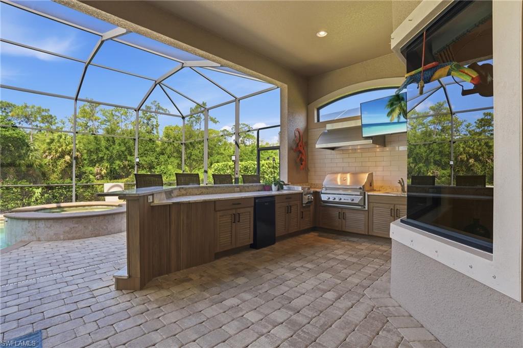 6453 Costa Circle Naples, FL 34113 - Photo 30 of 47 Outdoor Kitchen with Natural Gas