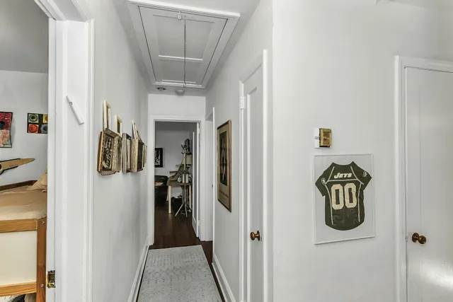 a view of an entryway with a workspace