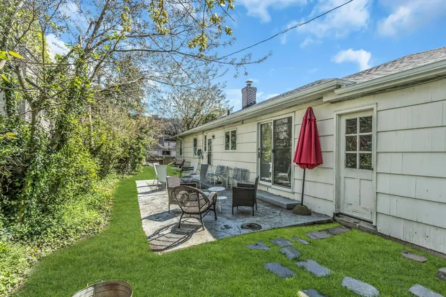 a view of a large body of water with a building in the background