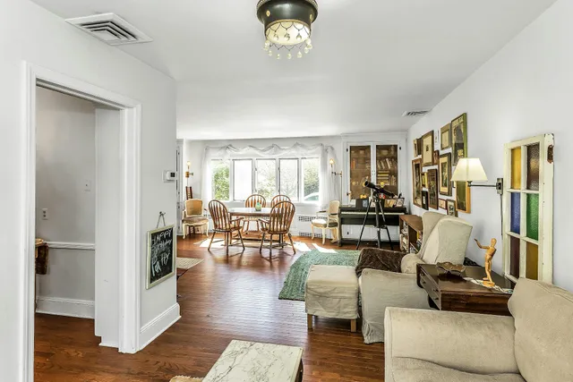 a living room with furniture and a table