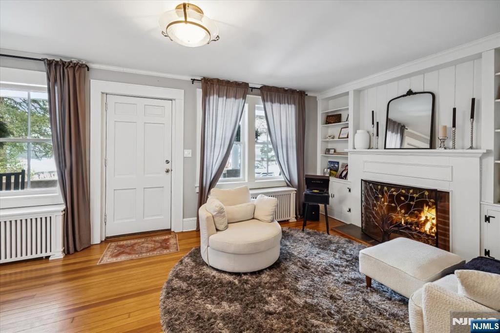 138 Chestnut Ridge Road Saddle River, NJ 07458 - Photo 2 of 31 a living room with furniture and a fireplace
