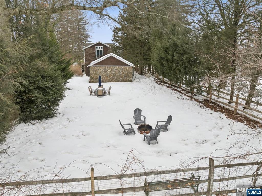 138 Chestnut Ridge Road Saddle River, NJ 07458 - Photo 21 of 31 a view of beach and front of house
