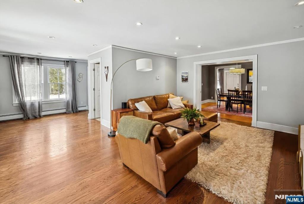 138 Chestnut Ridge Road Saddle River, NJ 07458 - Photo 6 of 31 a living room with furniture and wooden floor
