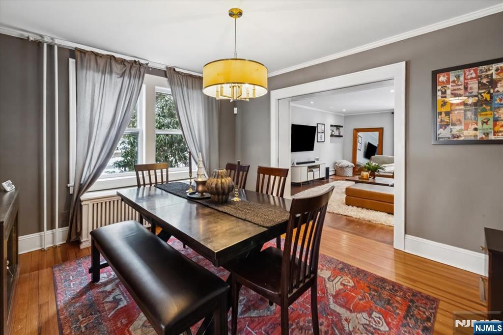 138 Chestnut Ridge Road Saddle River, NJ 07458 - Photo 8 of 31 a view of a dining room with furniture window and wooden floor