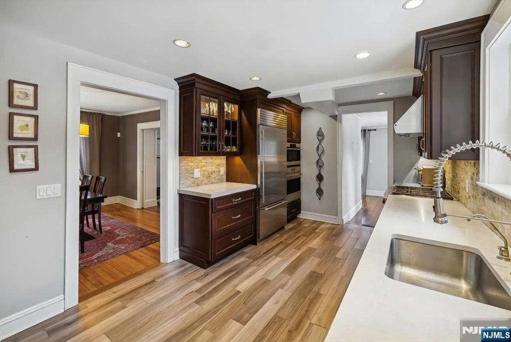 138 Chestnut Ridge Road Saddle River, NJ 07458 - Photo 10 of 31 a bedroom with furniture and a wooden floor