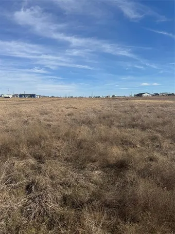 a view of an ocean and mountain