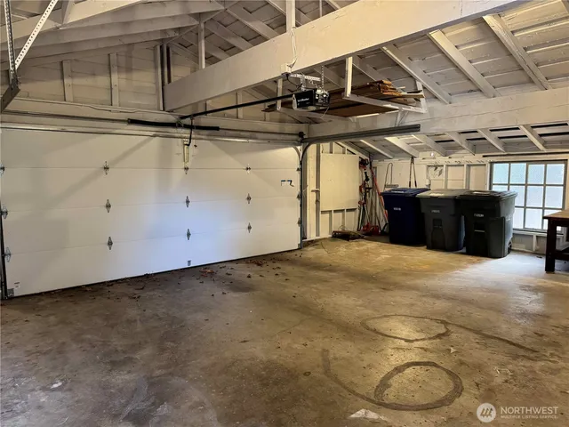 a view of balcony with wooden floor and fence