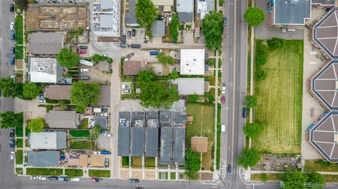an aerial view of residential houses and outdoor space