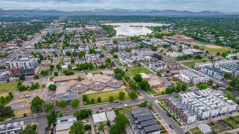 an aerial view of residential building and parking space