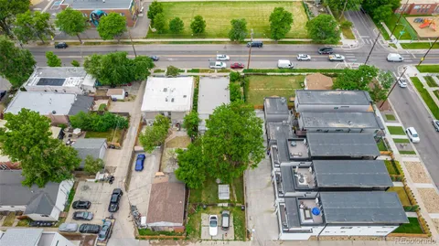 an aerial view of a house with outdoor space