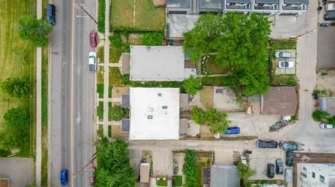 an aerial view of a house with outdoor space
