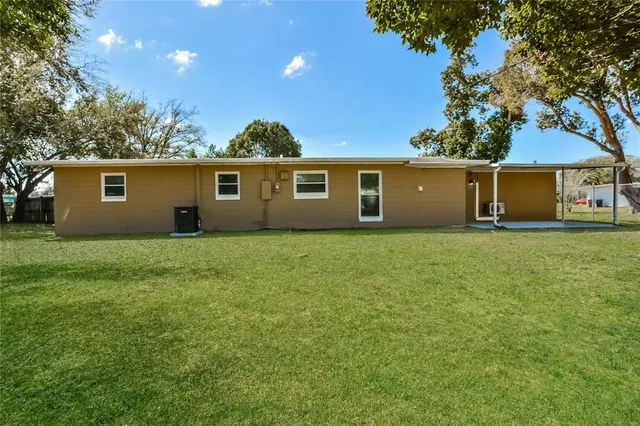 a front view of a house with yard