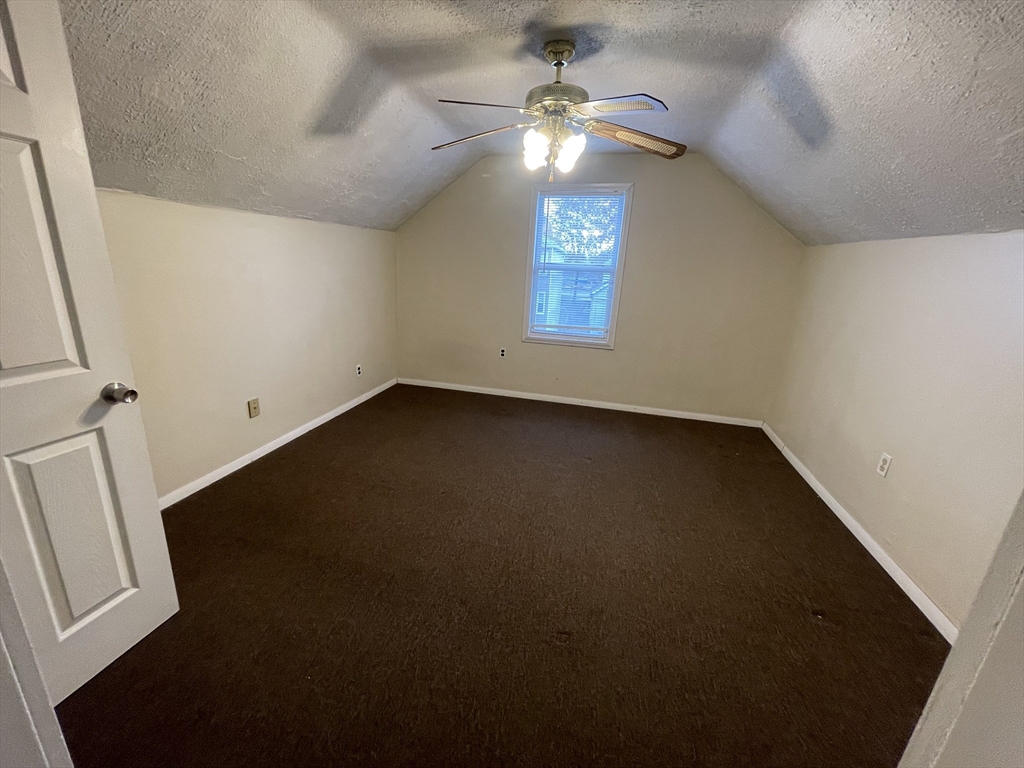 7 Buffum Street, Unit 2 Worcester, MA 01603 - Photo 19 of 23 an empty room with a window
