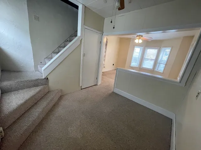 a view of hallway with stairs
