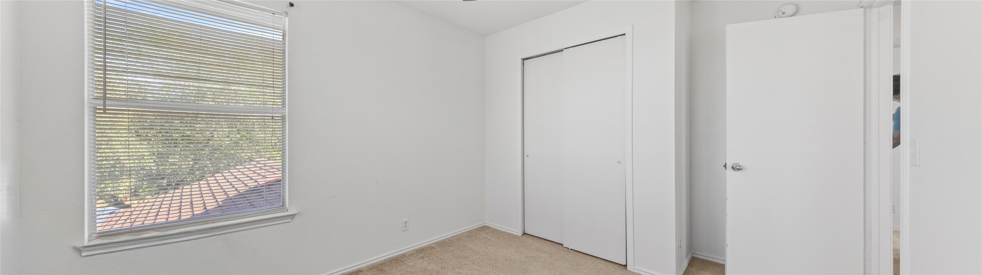 248 Endeavour Kyle, TX 78640 - Photo 20 of 32 Unfurnished bedroom with a closet and light colored carpet
