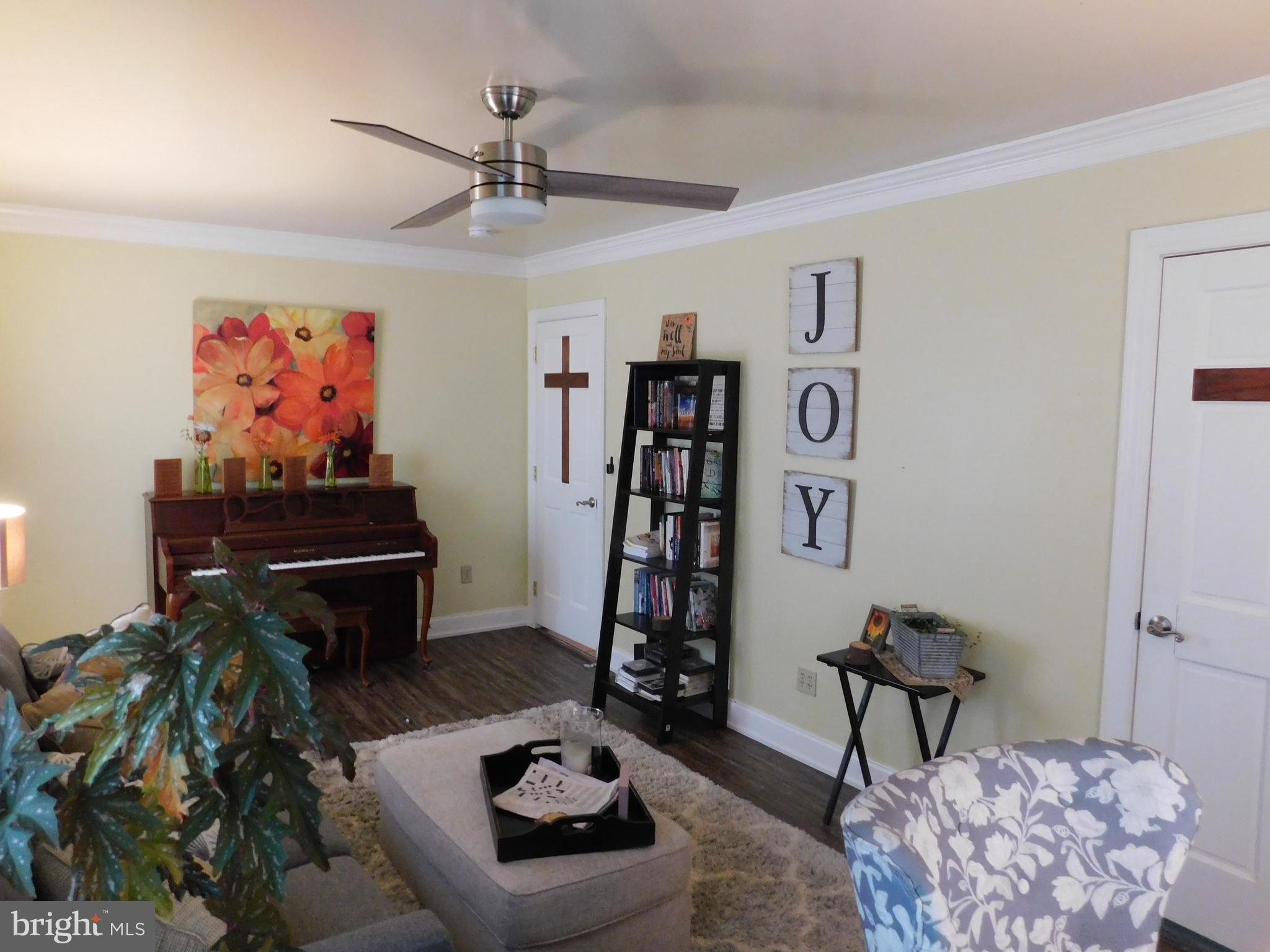 159 Miller Road Willow Street, PA 17584 - Photo 8 of 18 a living room with furniture and a piano