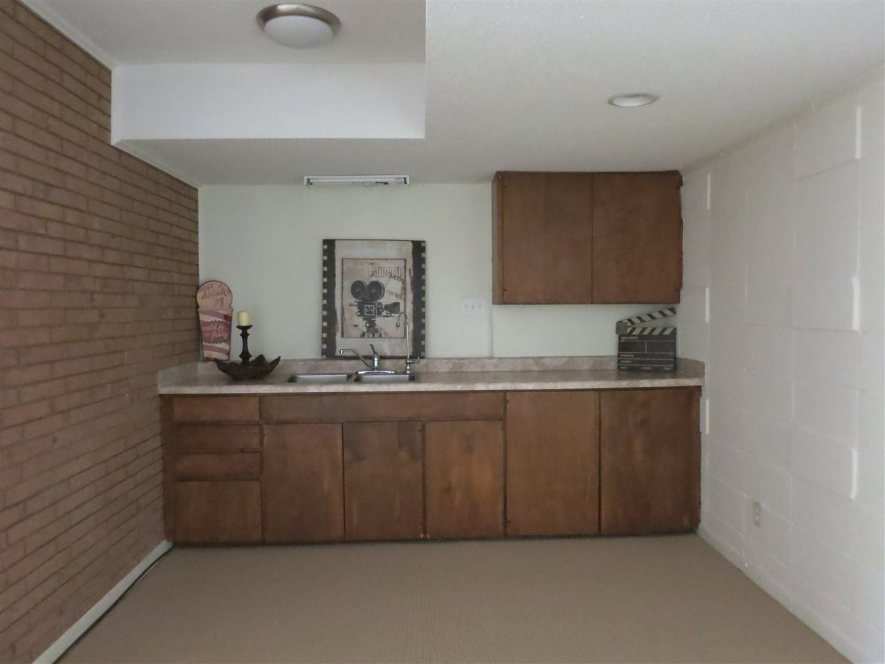 600 Davidson Street Raleigh, NC 27609 - Photo 20 of 25 Off the Family Rm is a Kitchenette w/dbl sinks and upper & lower cabinets. Kitchenette
