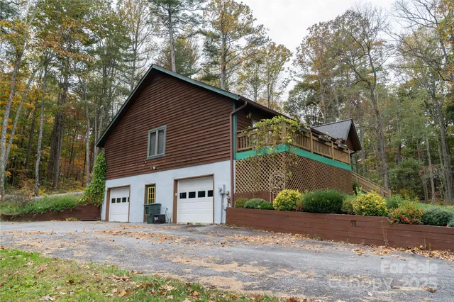 a view of a park with large trees