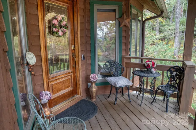 a outdoor living space with furniture and a potted plant