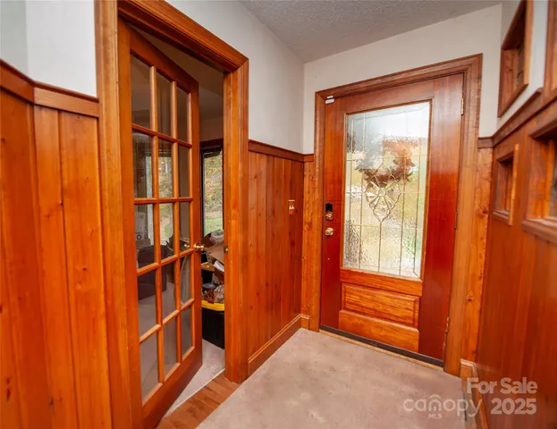a view of front door with stairs