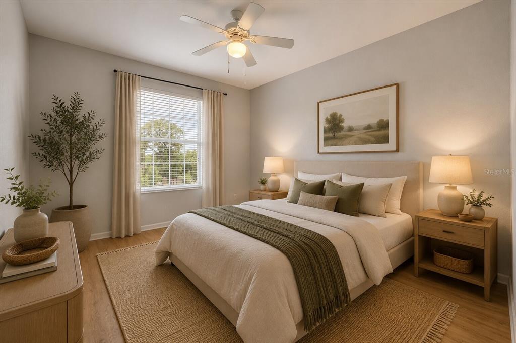 582 Brantley Terrace Way, Unit 304 Altamonte Springs, FL 32714 - Photo 3 of 30 a bedroom with a bed and a chandelier