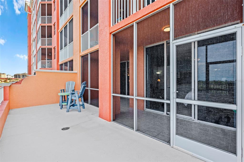 3191 Matecumbe Key Road, Unit 103 Punta Gorda, FL 33955 - Photo 32 of 48 a view of a building with glass door and furniture