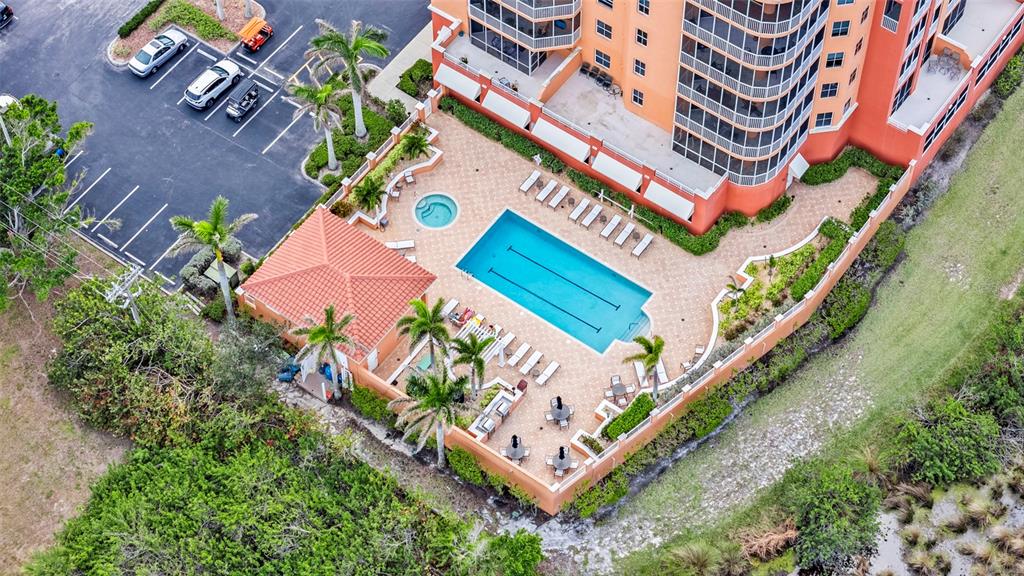 3191 Matecumbe Key Road, Unit 103 Punta Gorda, FL 33955 - Photo 36 of 48 an aerial view of a house with a yard and garden