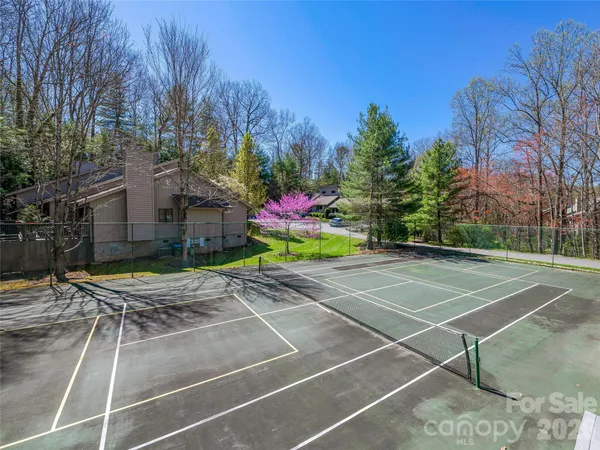 a outdoor space with lots of trees