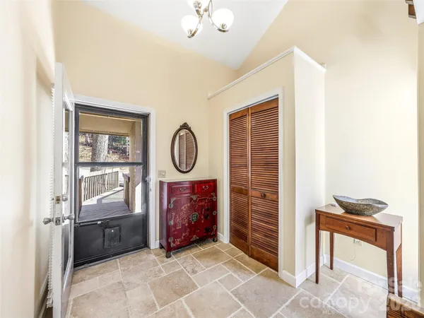 a view of an entryway with a fireplace