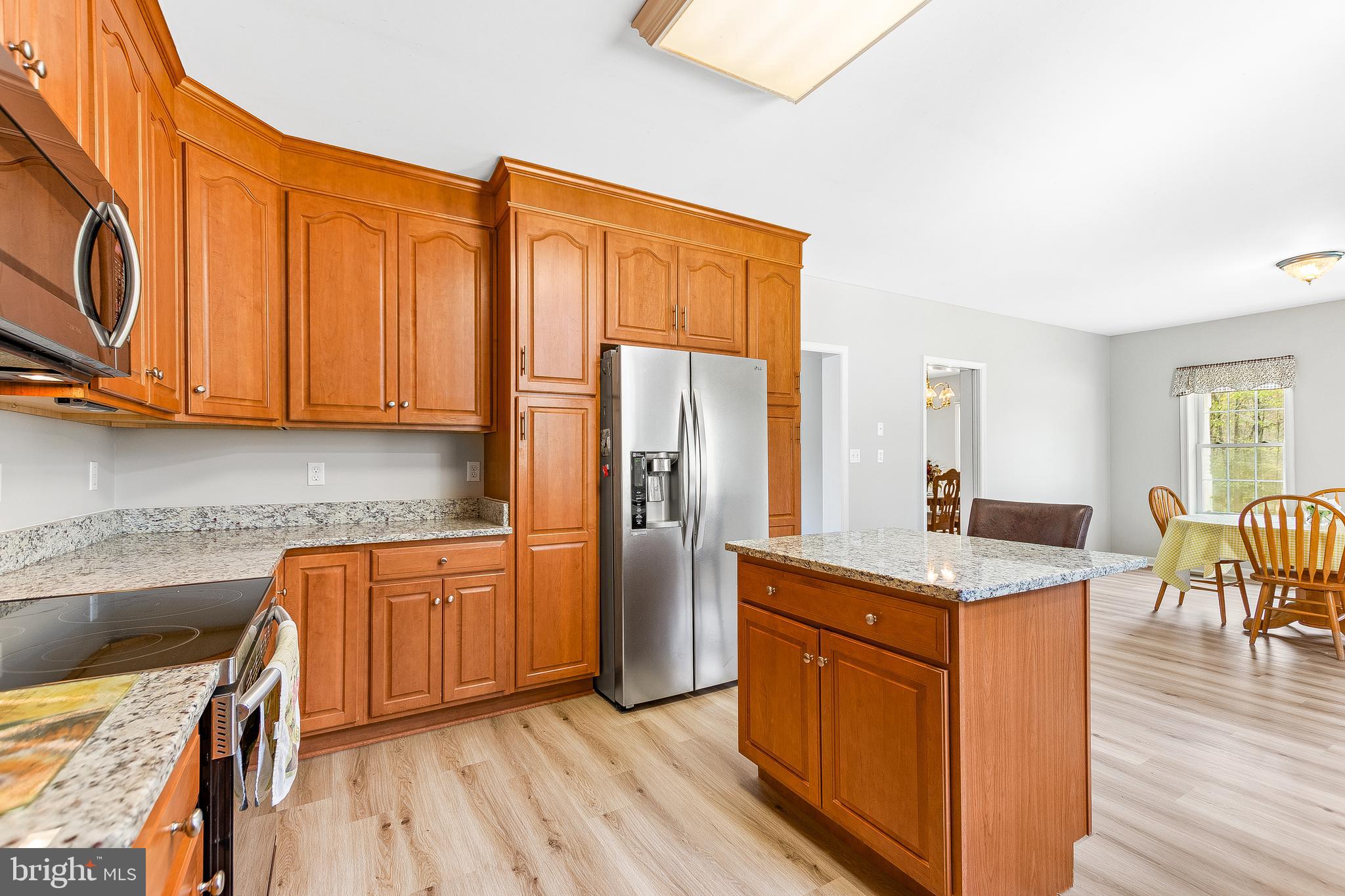 40280 Wathen Road Leonardtown, MD 20650 - Photo 24 of 64 Dual pantry cabinets surround the refrigerator