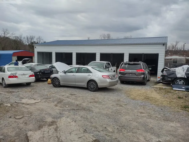 a view of cars parked in front of a house