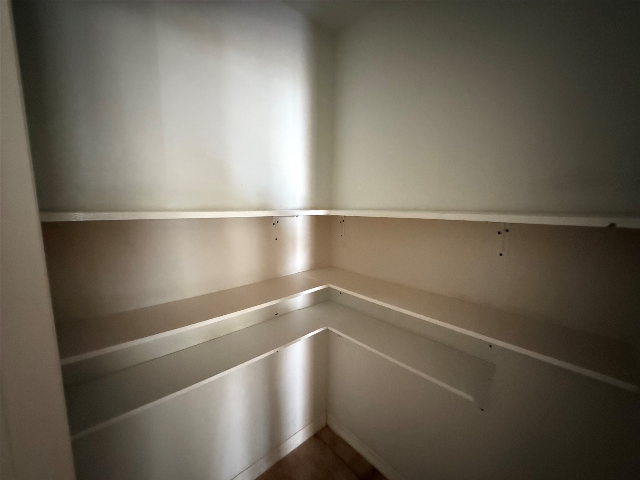 311 Kansas Street Bacliff, TX 77518 - Photo 4 of 12 a view of an empty walk in closet