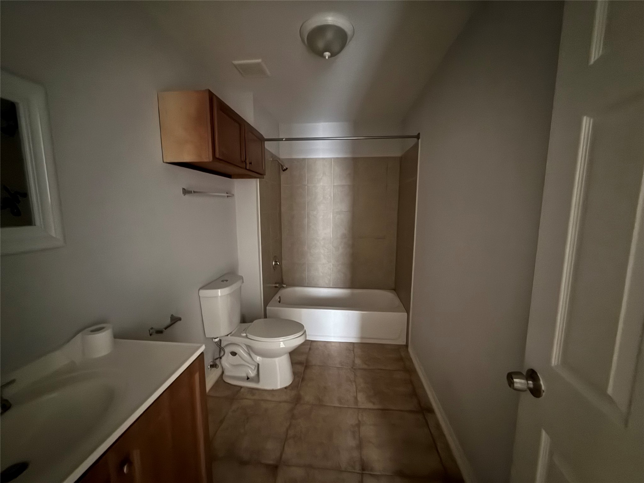 311 Kansas Street Bacliff, TX 77518 - Photo 8 of 12 a bathroom with a sink a toilet and shower