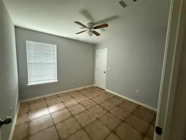 en empty room with windows