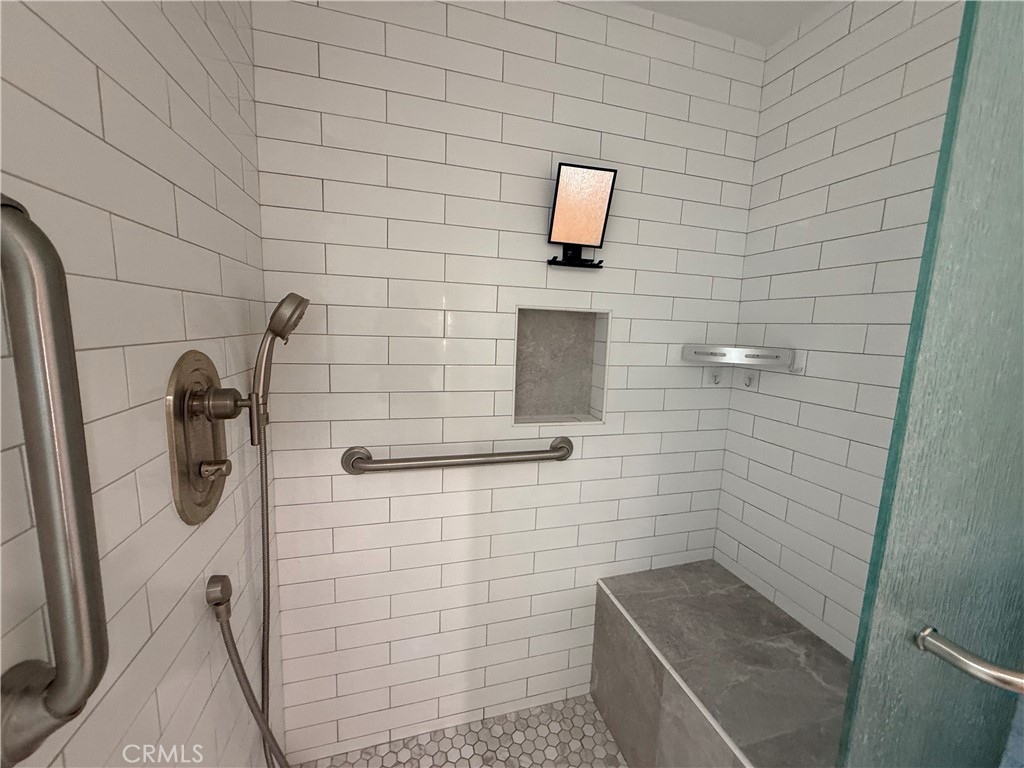 1330 Kenwood Rd M7-157f Seal Beach, CA 90740 - Photo 23 of 44 a bathroom with a shower