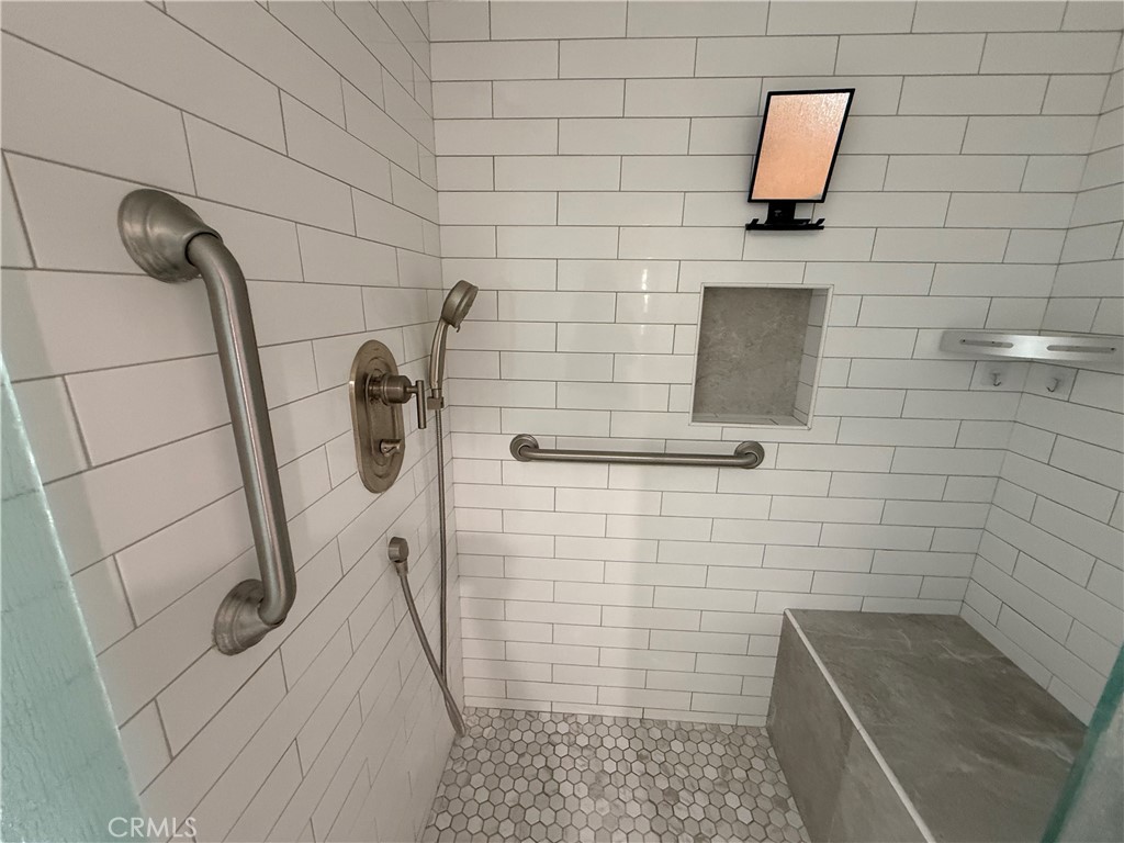 1330 Kenwood Rd M7-157f Seal Beach, CA 90740 - Photo 24 of 44 a bathroom with a shower