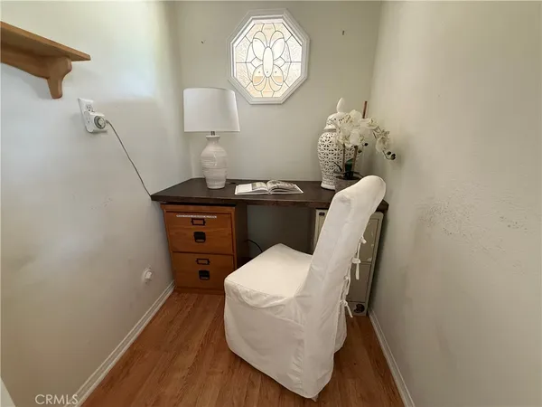 a view of entryway with wooden floor