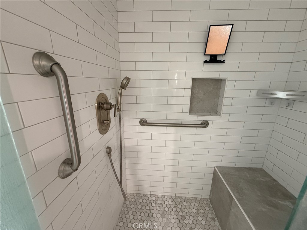 1330 Kenwood Rd M7-157f Seal Beach, CA 90740 - Photo 36 of 44 a bathroom with a shower