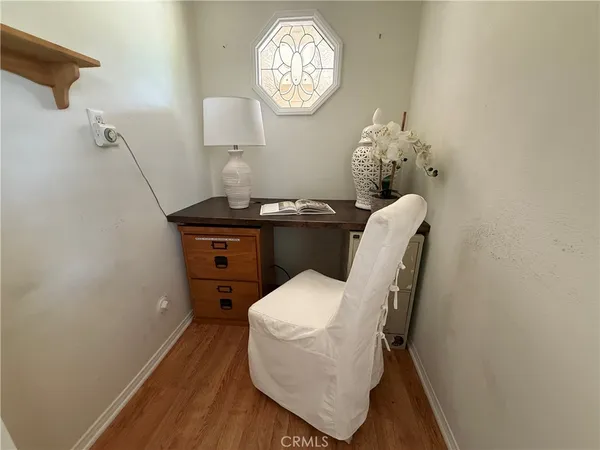 a view of entryway with wooden floor
