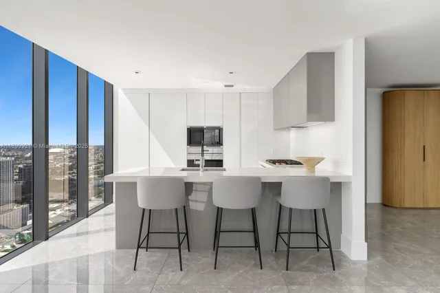a view of kitchen with breakfast area