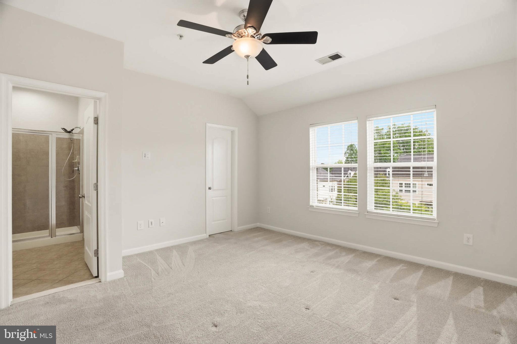 9817 Solar Course Laurel, MD 20723 - Photo 17 of 59 a view of an empty room with a window