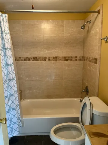 a bathroom with a sink and a shower