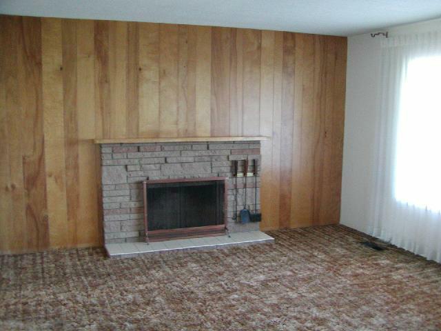 3250 Ashue Road Wapato, WA 98951 - Photo 5 of 9 a view of a livingroom with a fireplace