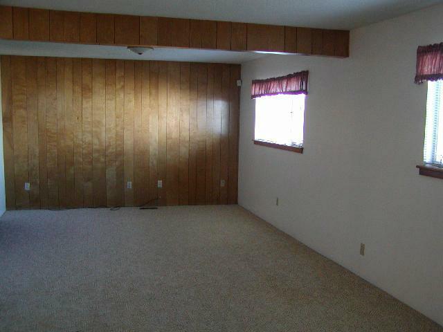 3250 Ashue Road Wapato, WA 98951 - Photo 6 of 9 a view of an empty room with a window