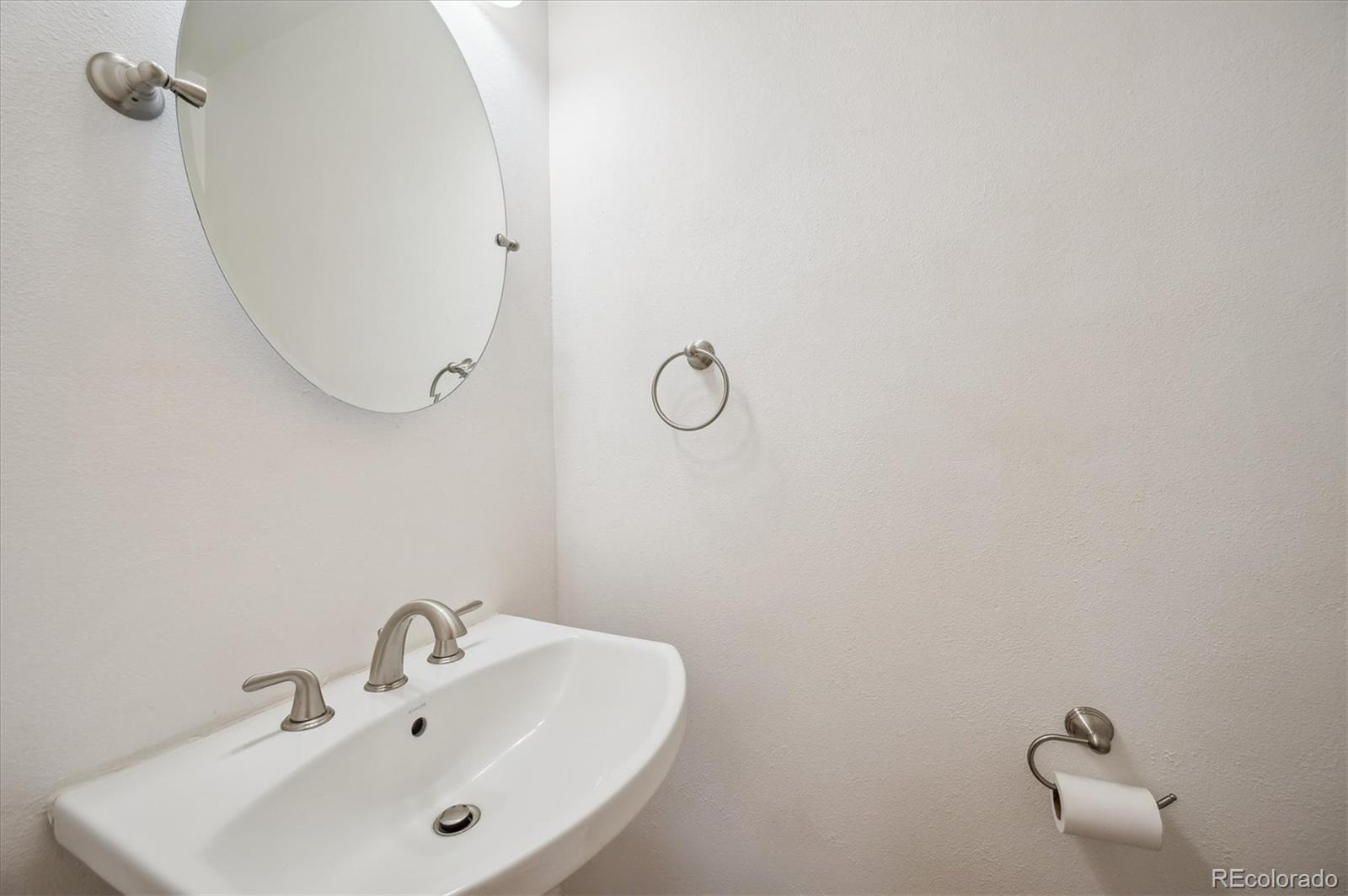 429 Overlook Drive Bailey, CO 80421 - Photo 15 of 36 a bathroom with a sink and mirror