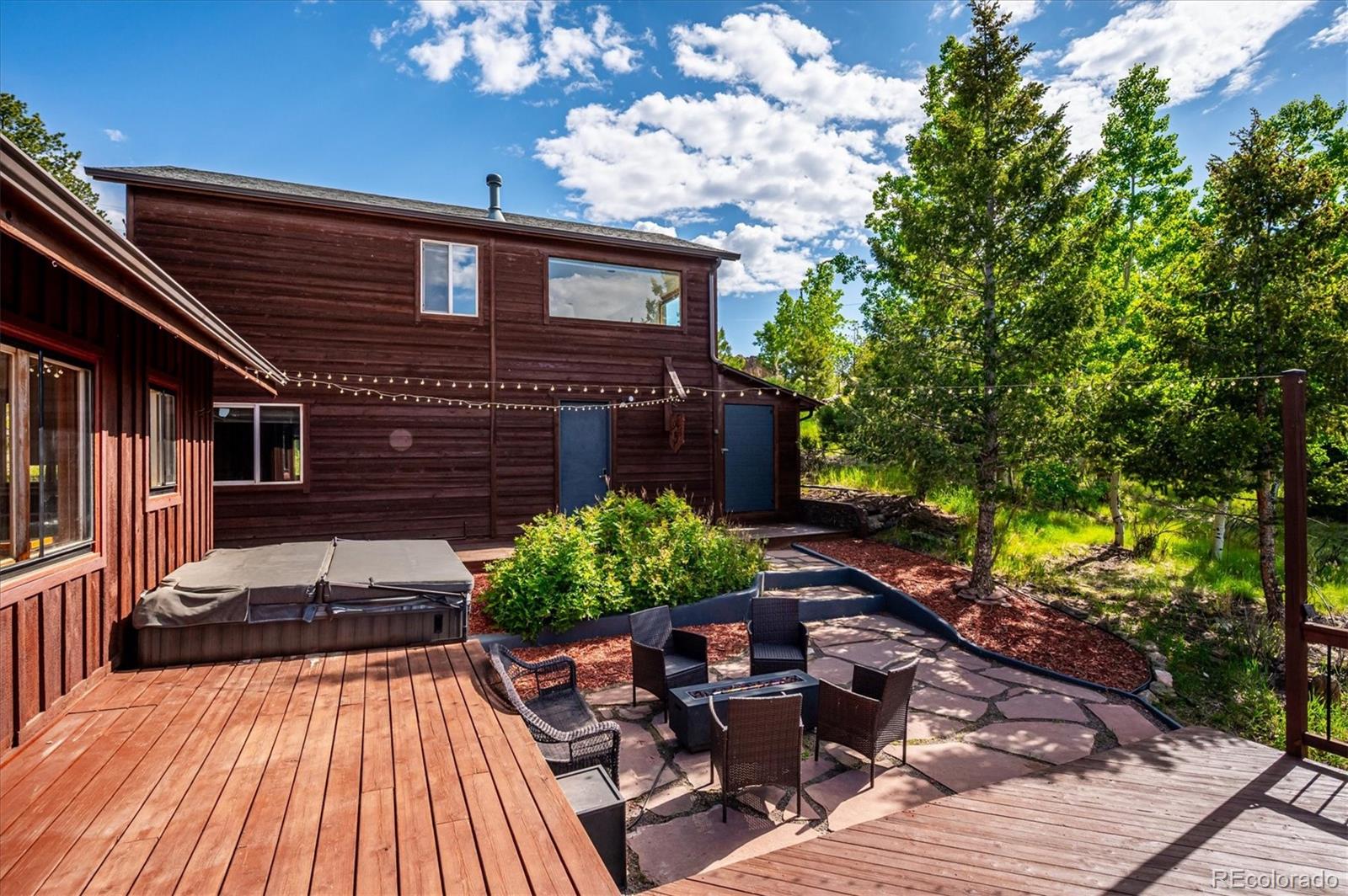 429 Overlook Drive Bailey, CO 80421 - Photo 3 of 36 a view of a house with backyard and sitting area