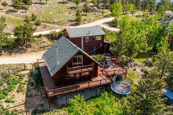 an aerial view of a house with a garden
